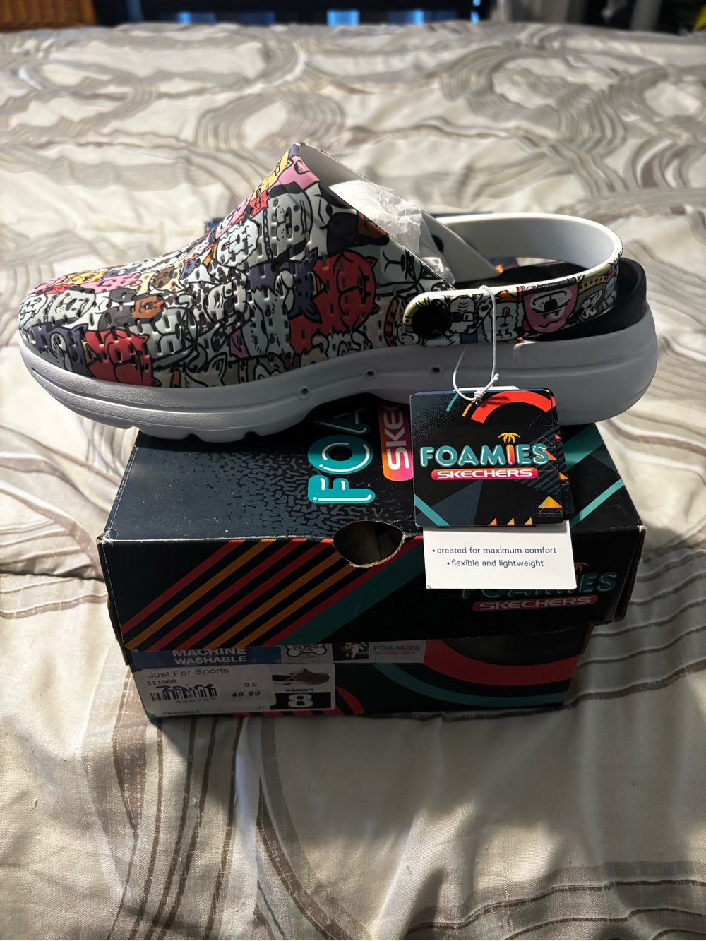 Skechers women’s Multicolor Cartoon Print Foamies Clog with White Solet